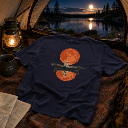 Moonlit Pause — Astronaut Canoe Graphic T-Shirt