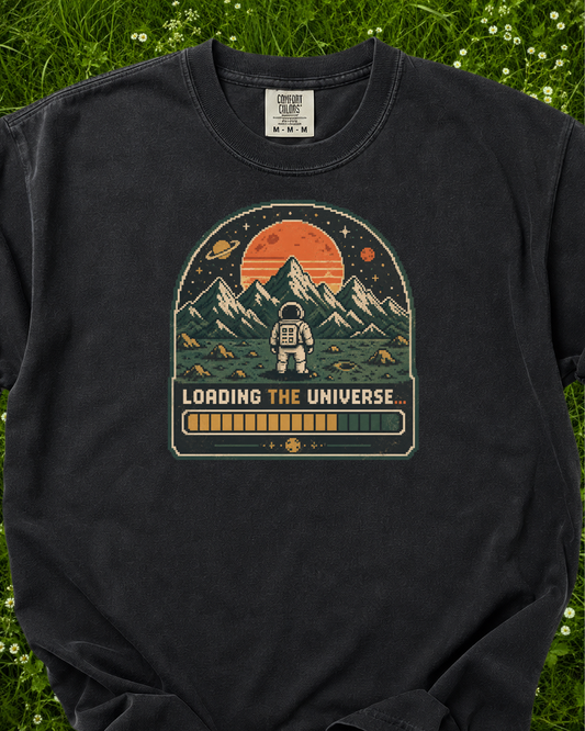 Loading the Universe astronaut graphic T-shirt product mockup