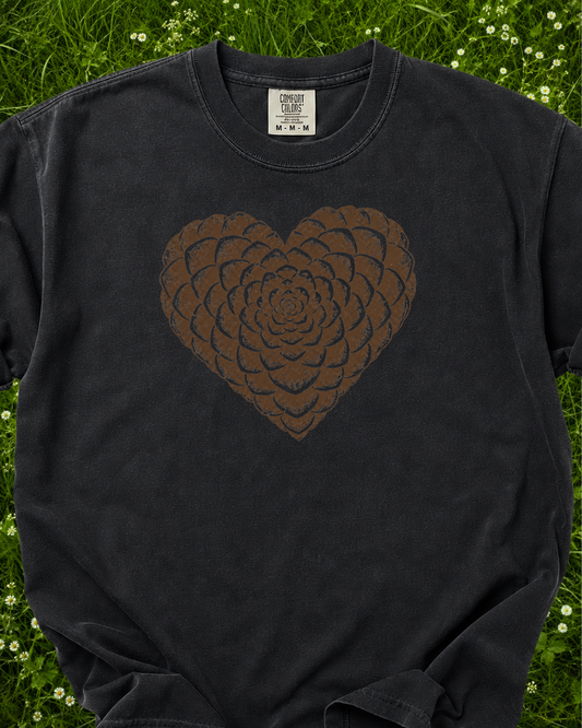 Heart of the Pines pinecone graphic T-shirt product mockup